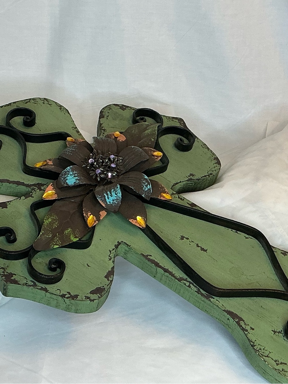 Green Distressed Metal Cross Wall Decor with Flower Accent